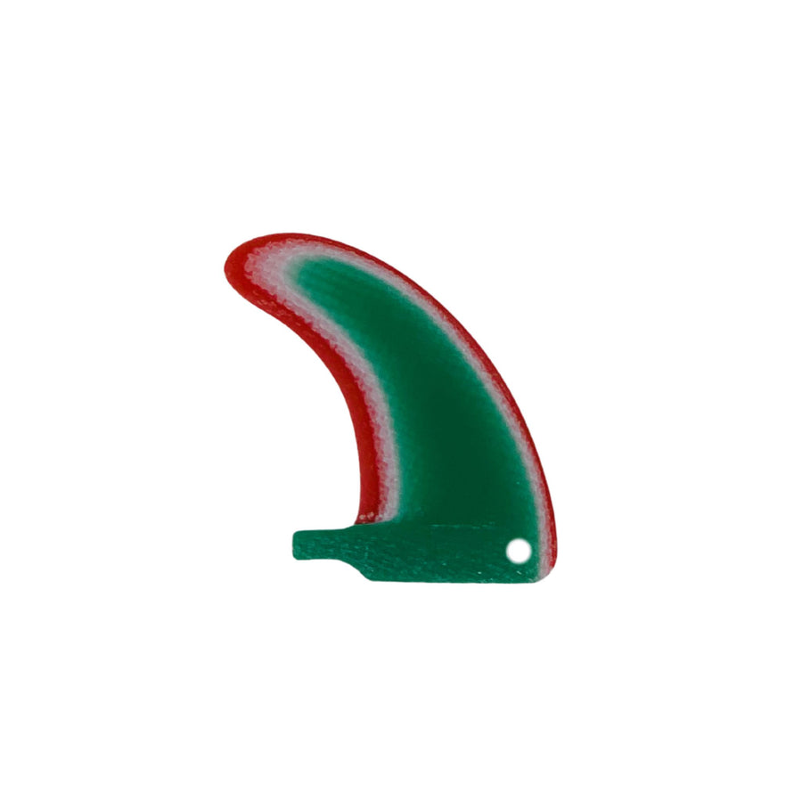Green and red plastic fin on a white background