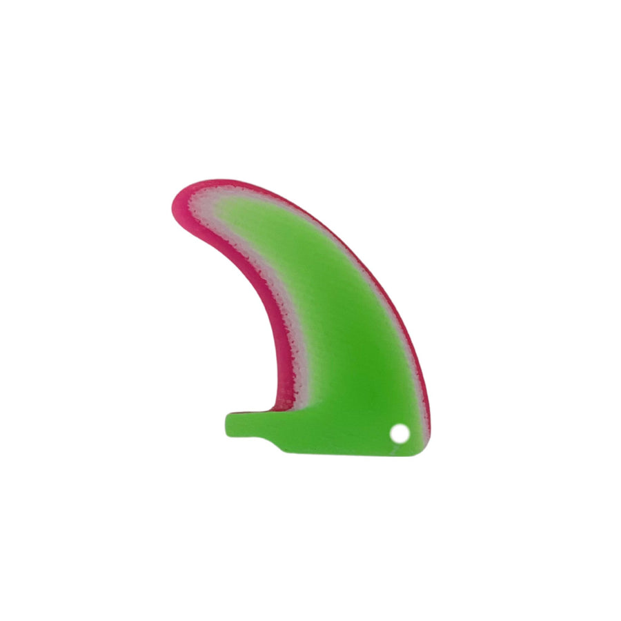Green and pink plastic fin on a white background
